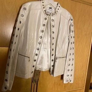 Iridescent white leather jacket with silver round studs on the sleeves & collar.